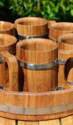 Set of oak beer mugs with a tray